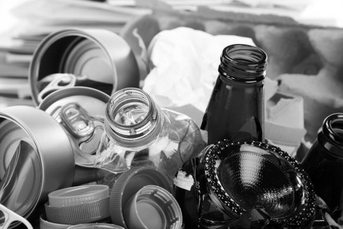 Volunteers and charity partners sorting reusable office furniture